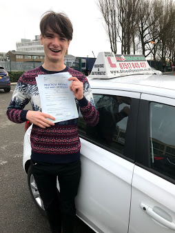 Student celebrating with instructor after passing