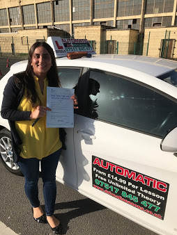 Young driver with keys to new car