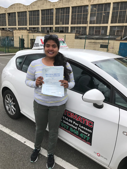 Happy female student with car keys