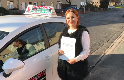 Student celebrating driving test success